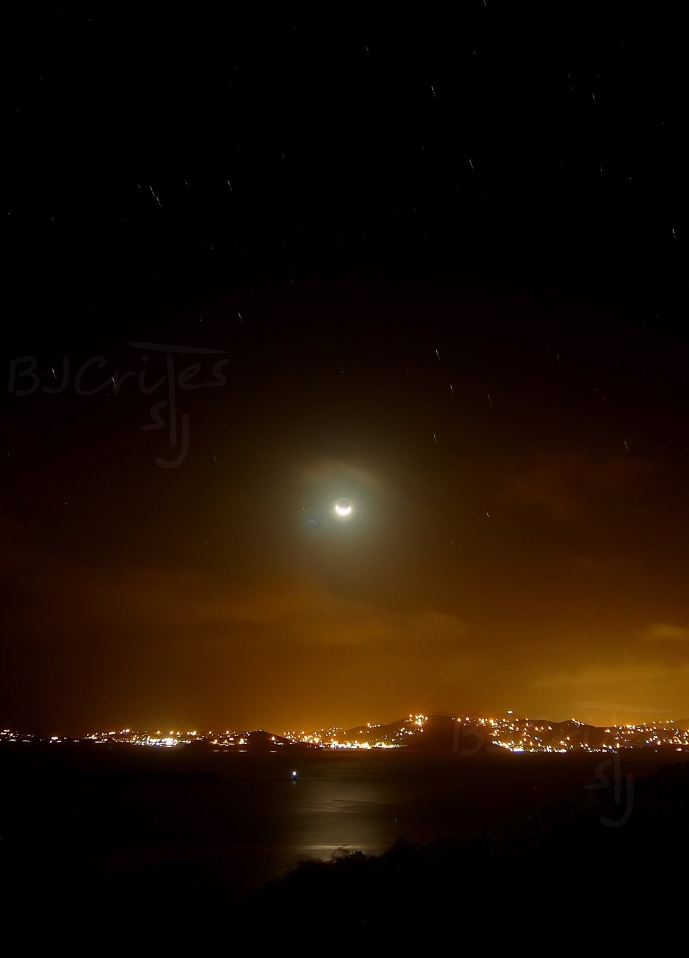 Moonset over St. Thomas from Cruz Bay, St. John, USVI
